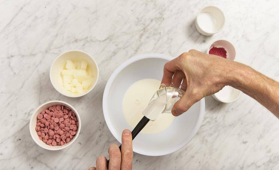 A chef makes a Ruby Chocolate Ganache