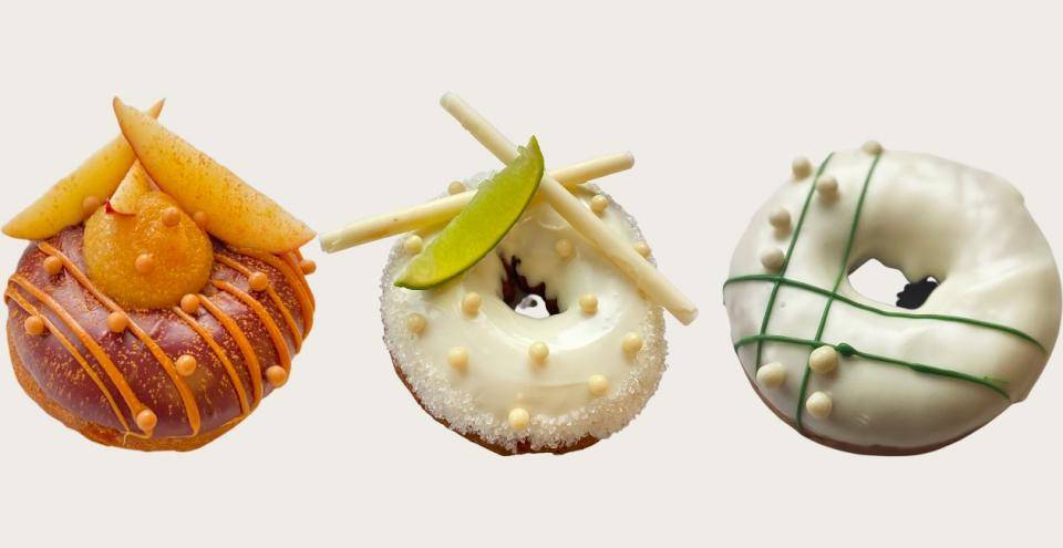 Three doughnuts: one fall-themed, one for summer, and one for Christmas